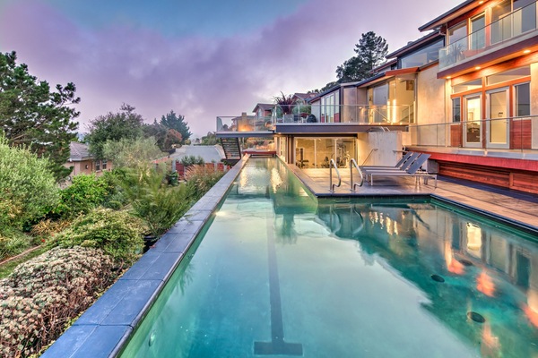 Pool from side paver patio