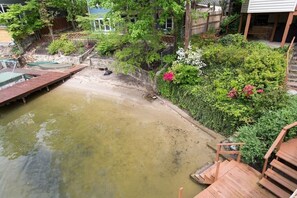 Another set of steps leads to a small beach and water that gradually increases in depth.