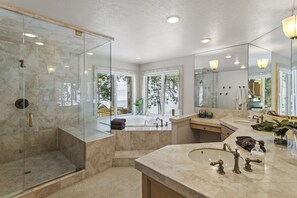 Bathtub, jetted tub, hair dryer, bathrobes