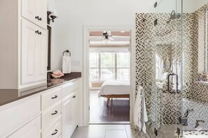 Bathtub, hair dryer, towels, soap