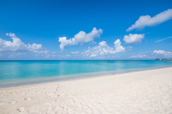 On the beach, sun-loungers, beach umbrellas, beach towels