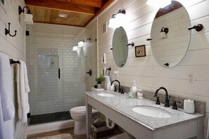 Bathtub, hair dryer, towels, soap