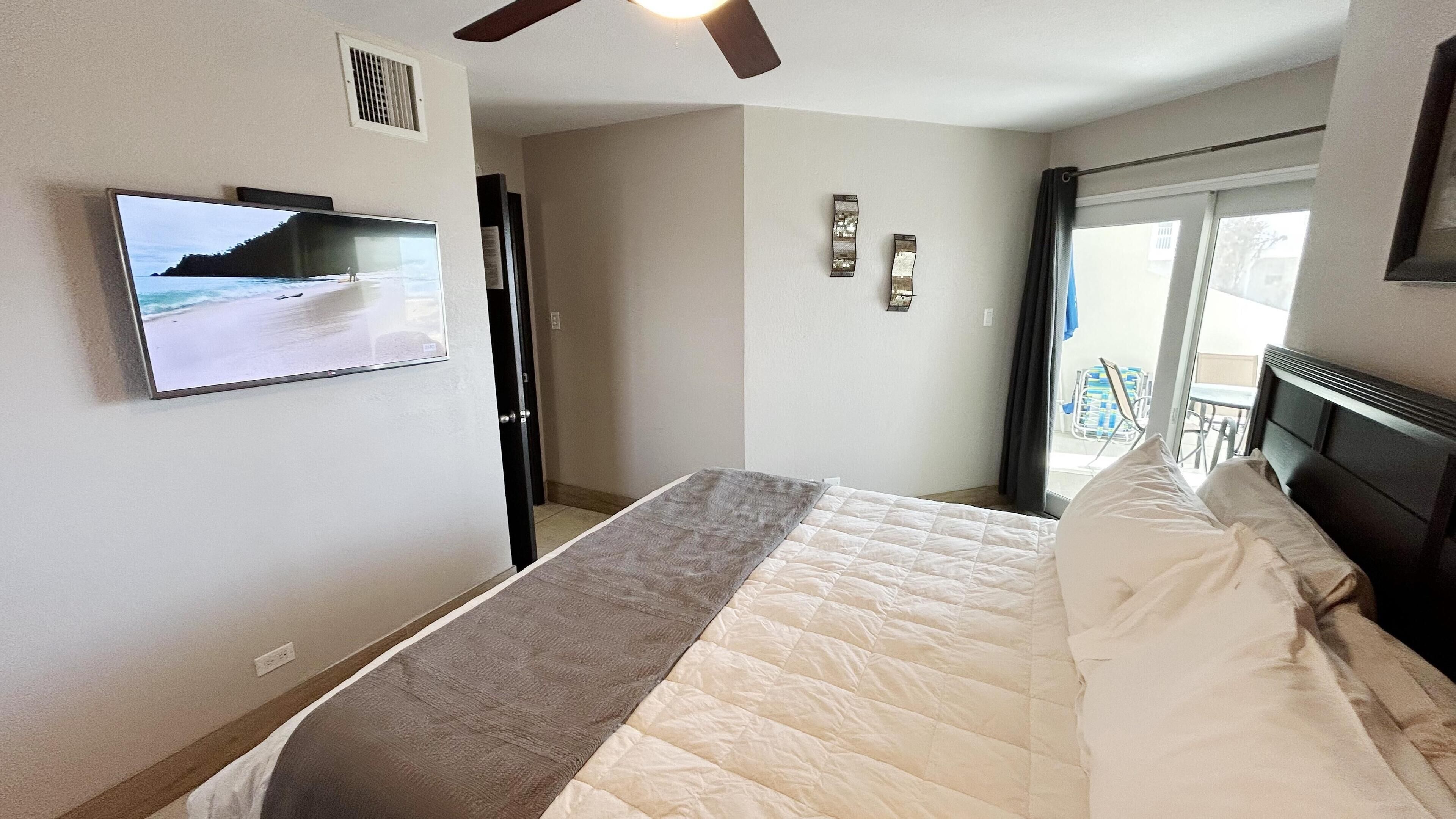 Primary bedroom with smart TV