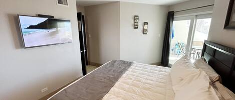 Primary bedroom with smart TV