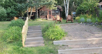 Private beach and pier at this cozy lakefront cottage in a quiet bay.5 lake.
