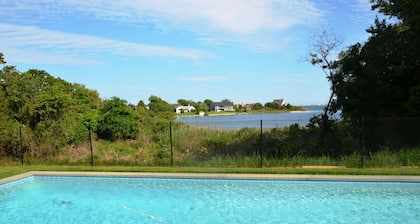 Luxurious Waterfront Retreat in Southampton: Breathtaking Views, Pool, and More!