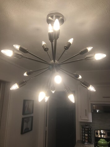 Starburst over kitchen island. We have had so much fun with our lighting.