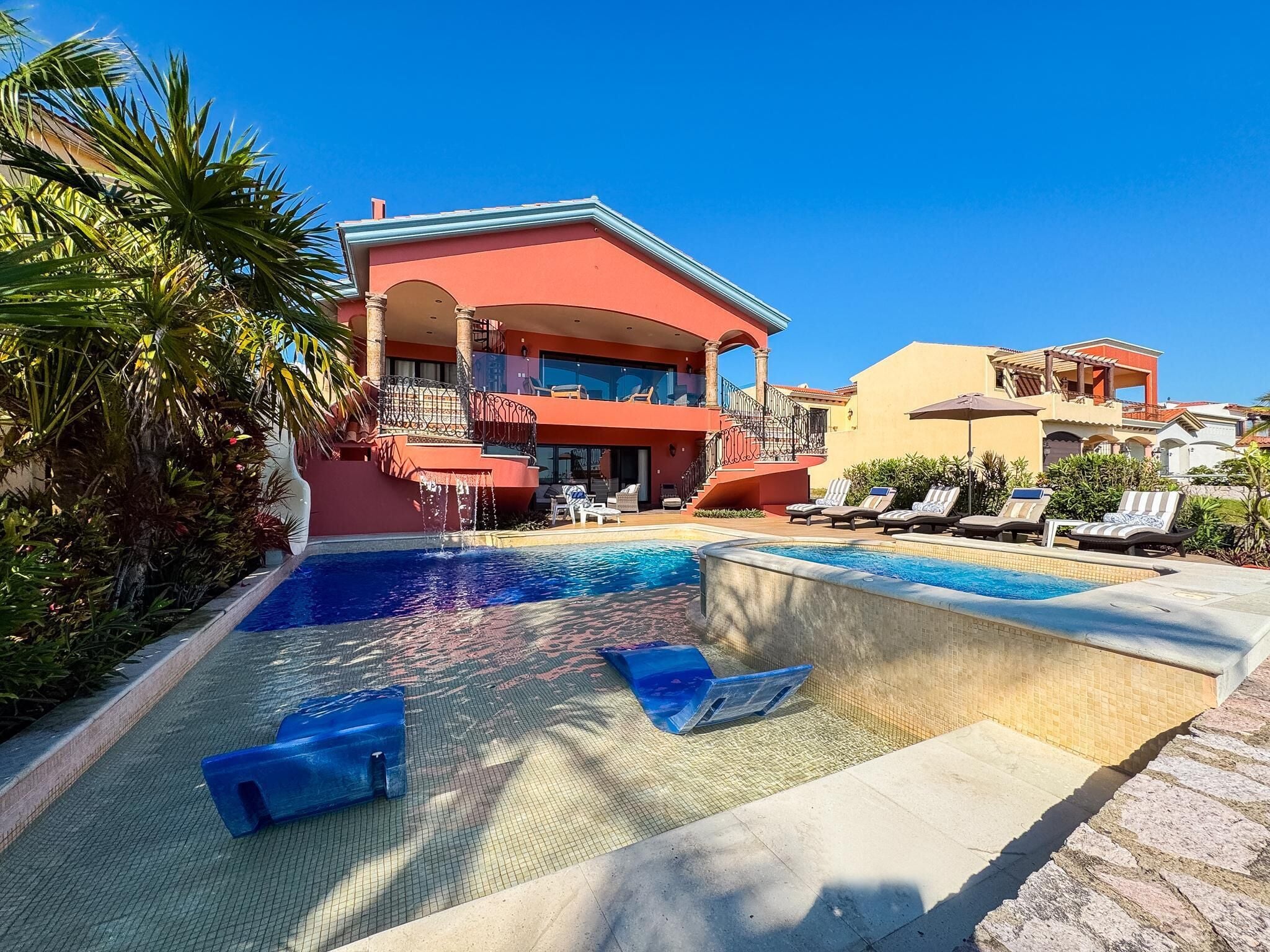 Sun-soaked poolside retreat with spacious outdoor lounge