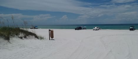 On the beach, sun-loungers