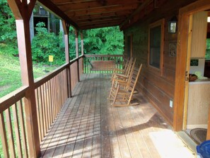 Guests can sit and relax on the porch with rocking chairs.
