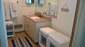 Combined shower/bathtub, hair dryer, towels, soap - Contemporary Beach House with Vaulted Ceilings and Lots of Sunshine (Fire Island)