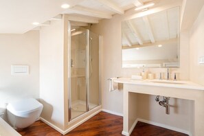 Bathtub, hair dryer, towels