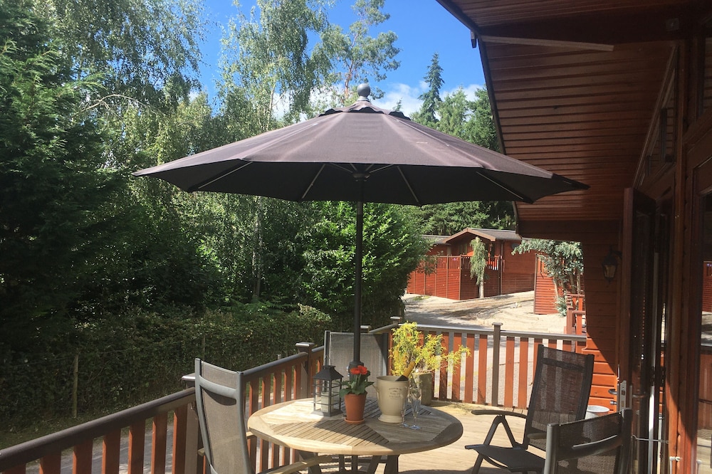 4 star Luxury Lakeside Pine Lodge/ Cabin ( sauna) in secluded Shropshire setting