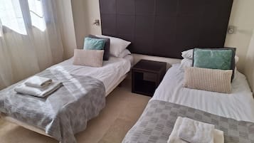 2 slaapkamers, een strijkplank/strijkijzer, wifi, beddengoed