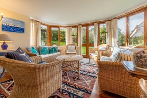 Flat-screen TV, fireplace, DVD player, music library