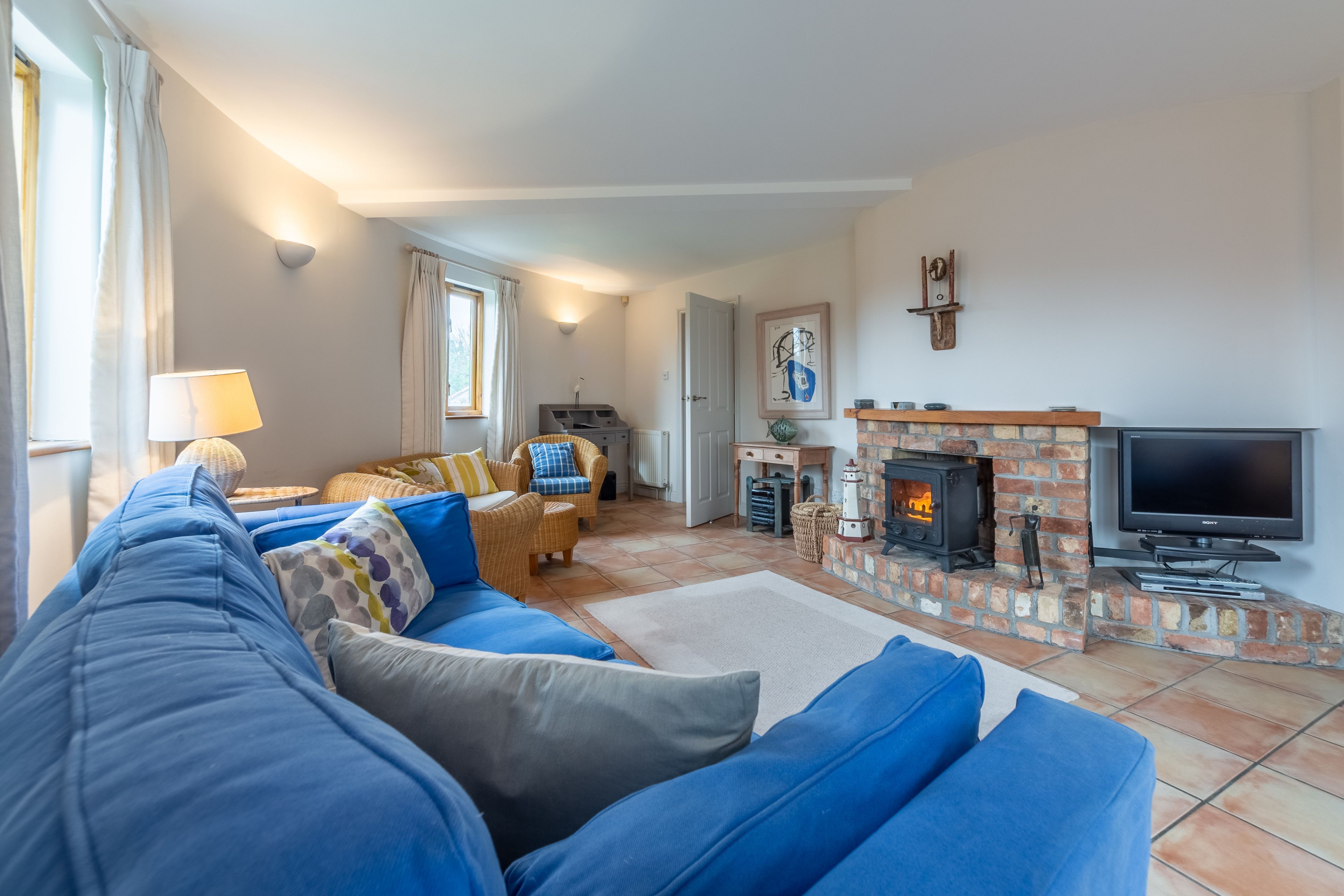 Fernseher, Kamin, Musikbibliothek, Stereoanlage