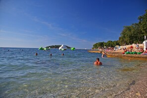 Beach nearby, sun loungers