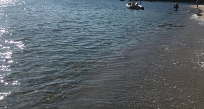 Lovely, functional apartment with sea and mountain views on private land