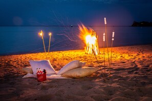 On the beach, sun loungers, beach towels
