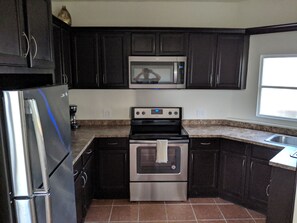 Fridge, microwave, oven, stovetop - Family Condo located in Rosarito, Mexico (Predios Urbanos)