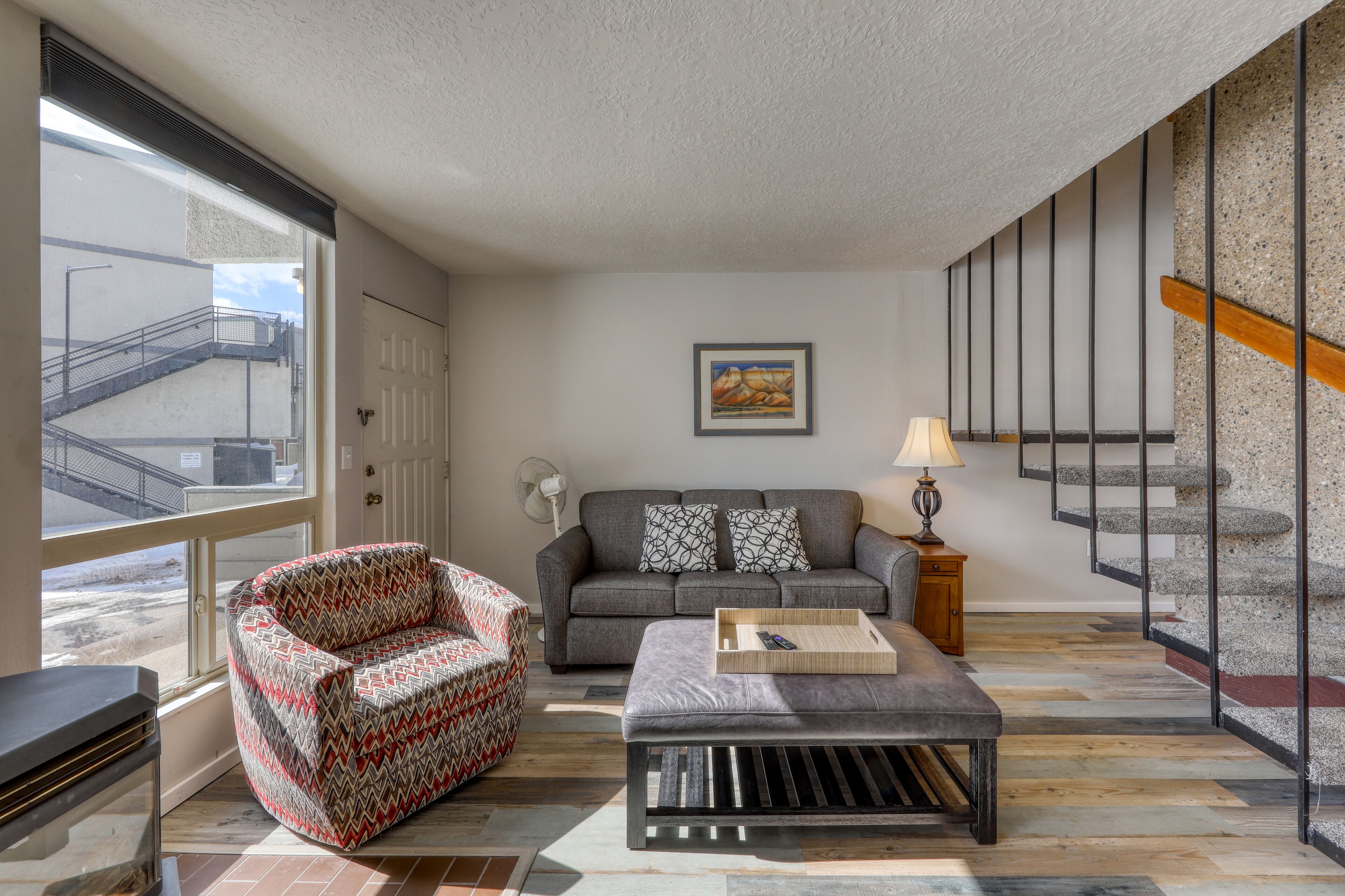 Updated creekside condo with private sauna, patio, mountain views & free WiFi