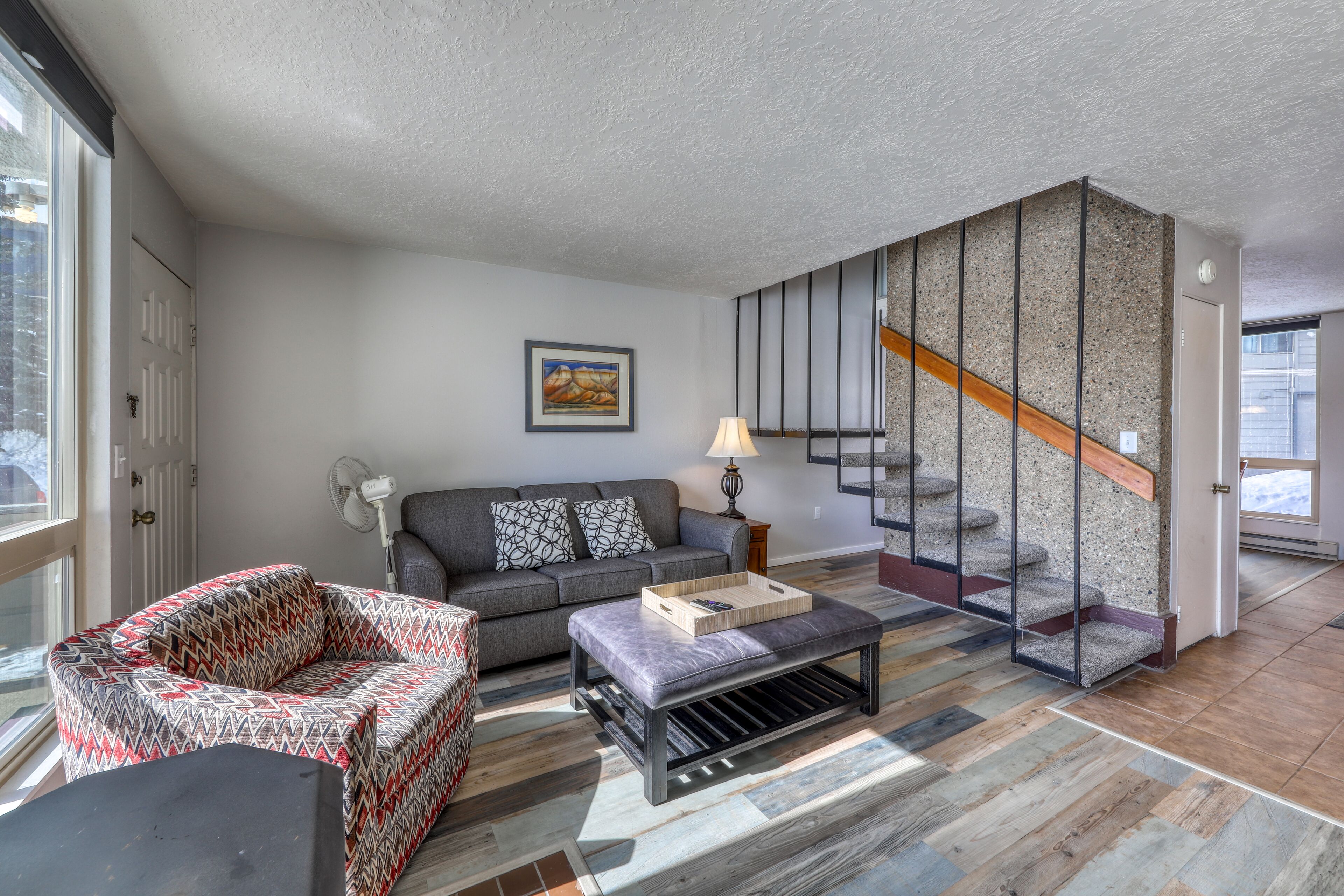 Updated creekside condo with private sauna, patio, mountain views & free WiFi