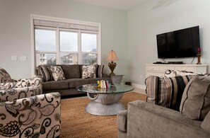 TV connectée, lecteur de DVD, livres, vidéothèque