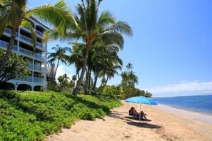 On the beach, sun-loungers, beach towels