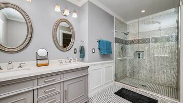 Combined shower/bathtub, hair dryer, towels, soap