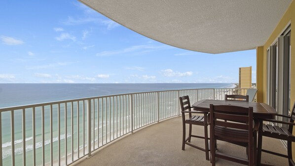 Outdoor dining - Emerald Isle 1401 - Front row beach chair service included! Affordable rates! (Panama City Beach)