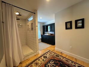 Combined shower/tub, hair dryer, towels, toilet paper