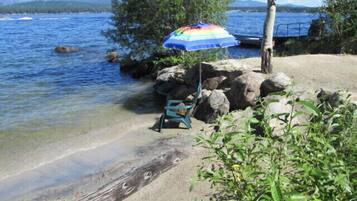 On the beach, sun-loungers, beach towels