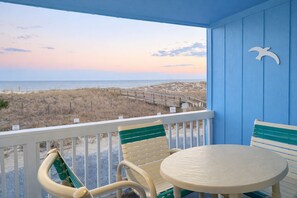 Outdoor dining - Oceanfront 2 bedroom condo- Pet Friendly- Mermaids Retreat (Carolina Beach)