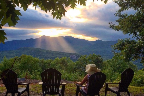 Watch the sunset in an adirondack and enjoy the show!