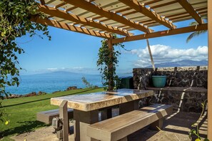 Outdoor dining - 203 - Gorgeous Remodeled Oceanfront unit with A/C! (Kihei)