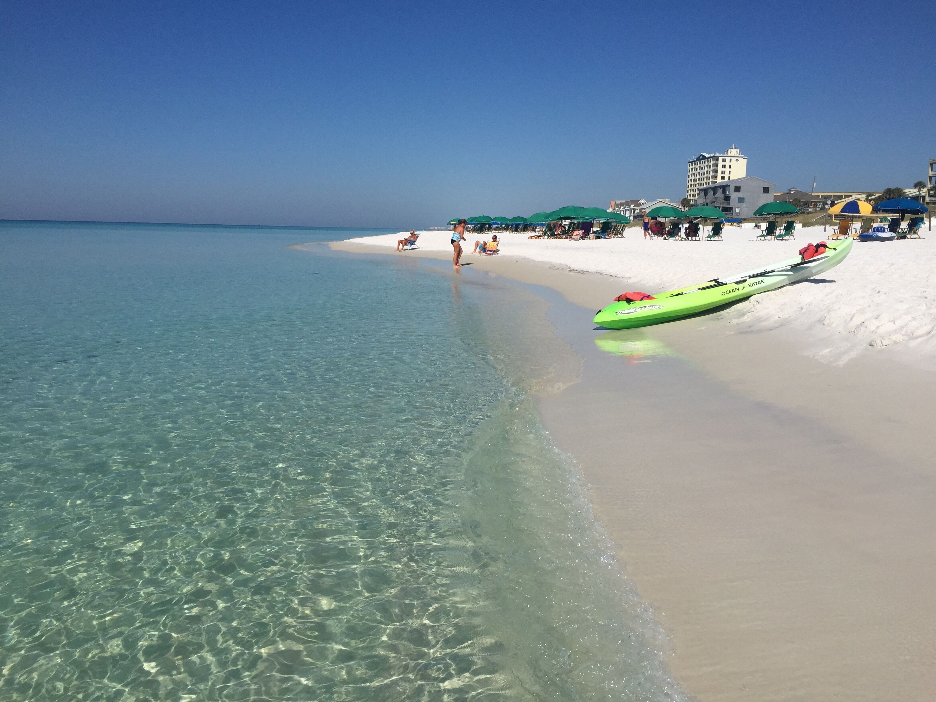 On the beach, sun-loungers