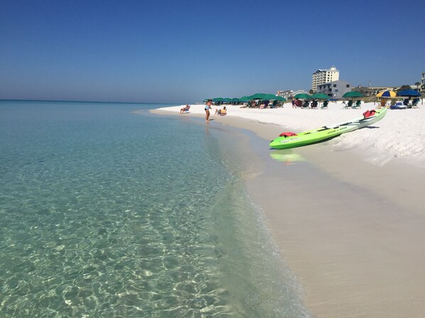 On the beach, sun-loungers