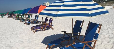 On the beach, sun loungers
