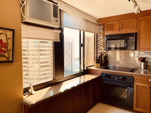 Fridge, microwave, oven, stovetop - Elegant Windsor Waikiki Condo (Honolulu)