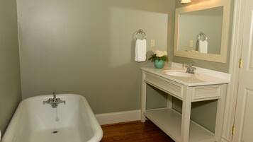 Bathtub, hair dryer, towels, soap