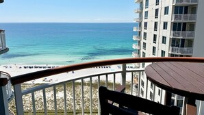A balcony with a view of the ocean and beach. - Beach Colony West 16F- 3BR Gulf Front w/Beach Service and Onsite Management (Navarre)