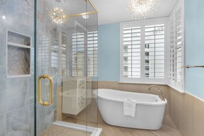Shower, jetted bath, hair dryer, towels