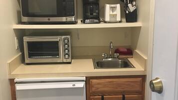 Fridge, microwave, stovetop, coffee/tea maker