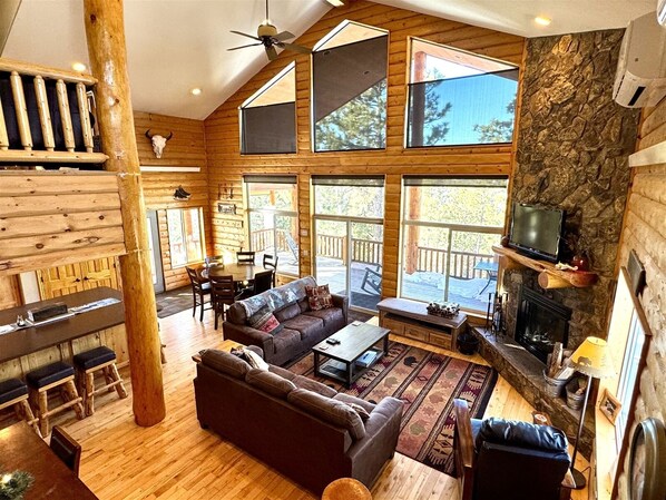 TV, fireplace - North Ridge Cabin-Panoramic views from the covered deck or the hot tub (Lead)
