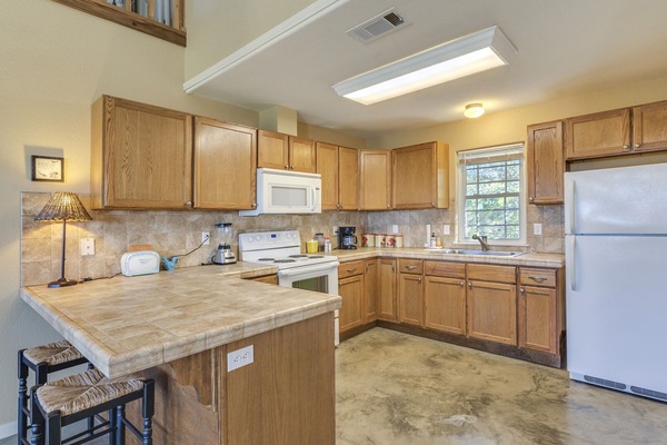 Frigorifero, microonde, forno, piano cottura