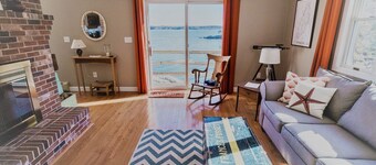 Enjoy the stunning views while relaxing on the deck at East Ledge Cottage