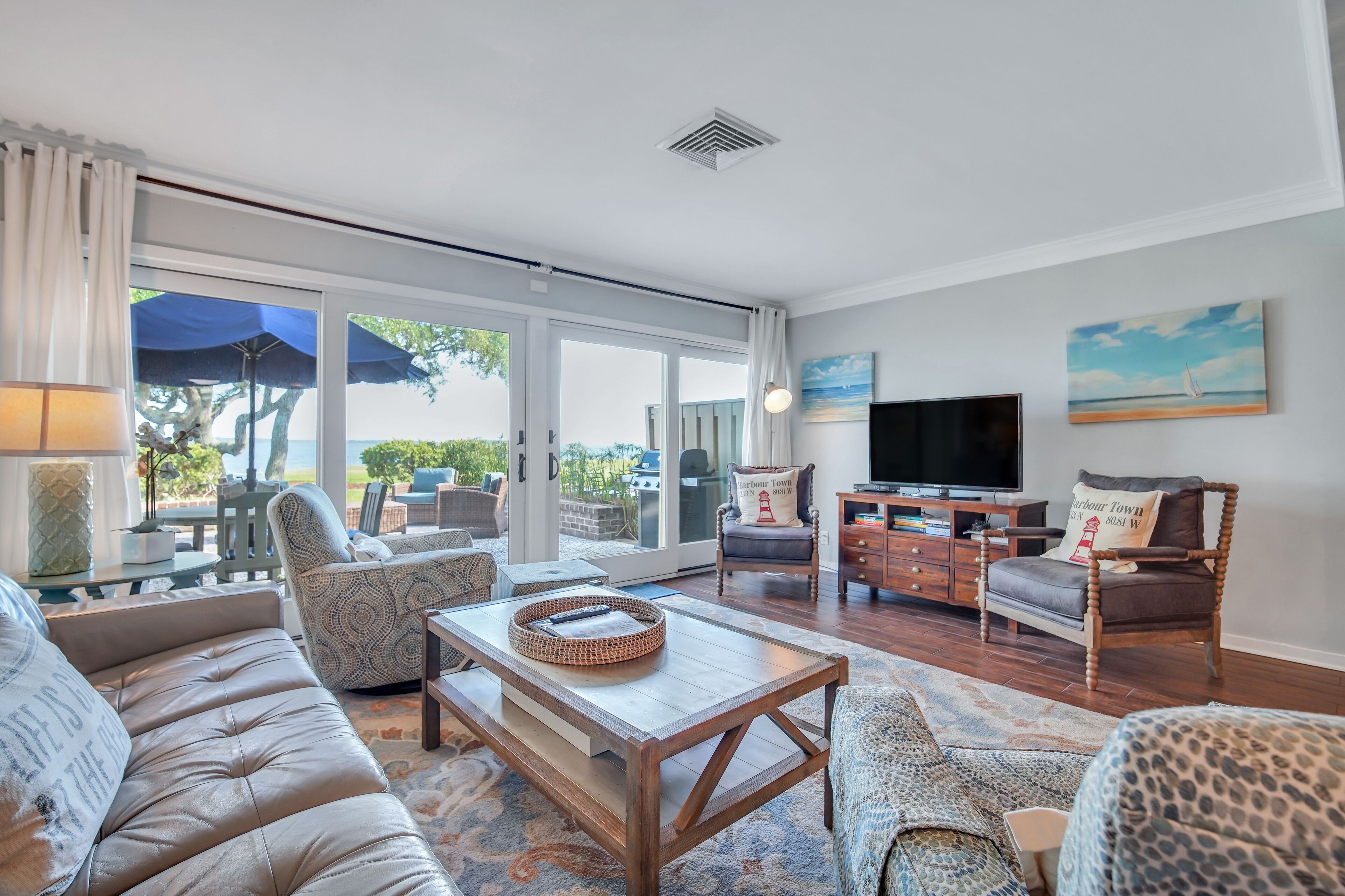 703 Schooner Court sleeps 7 with Calibogue sound views in Harbour Town. Book your stay today!