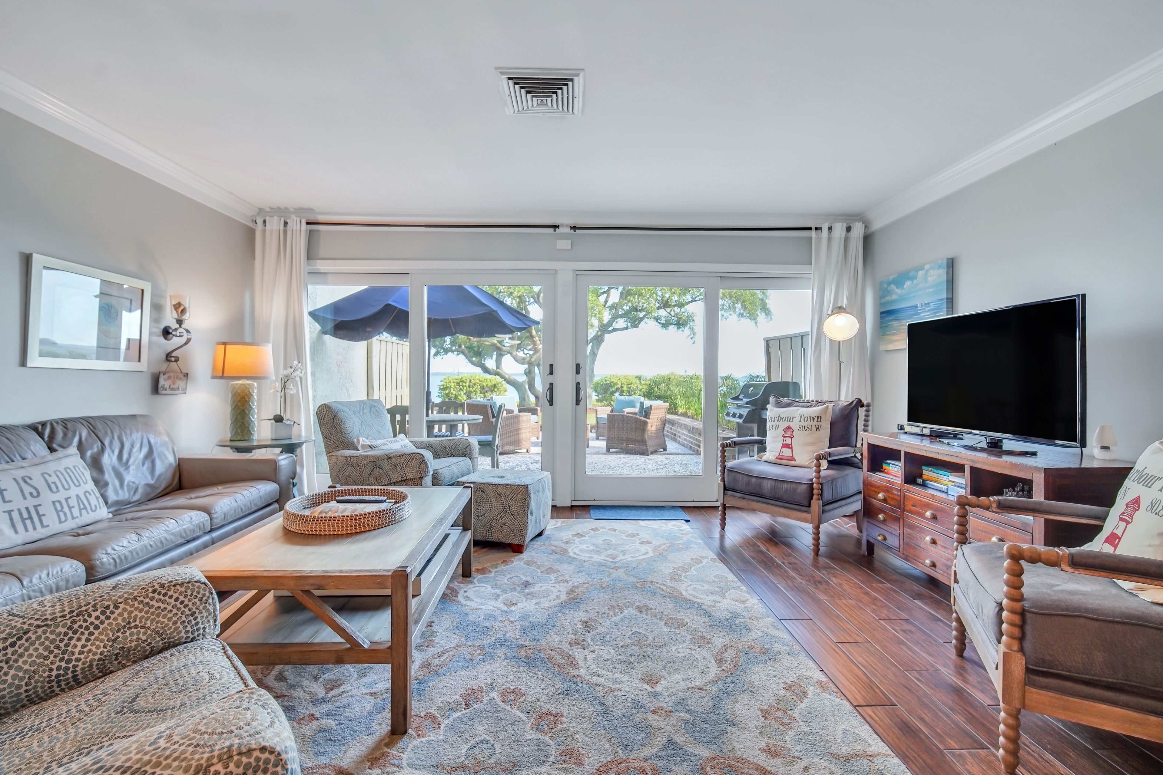 703 Schooner Court sleeps 7 with Calibogue sound views in Harbour Town. Book your stay today!