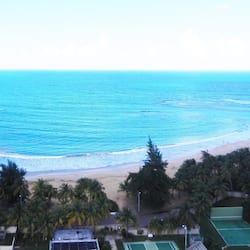 On the beach, sun loungers, beach towels
