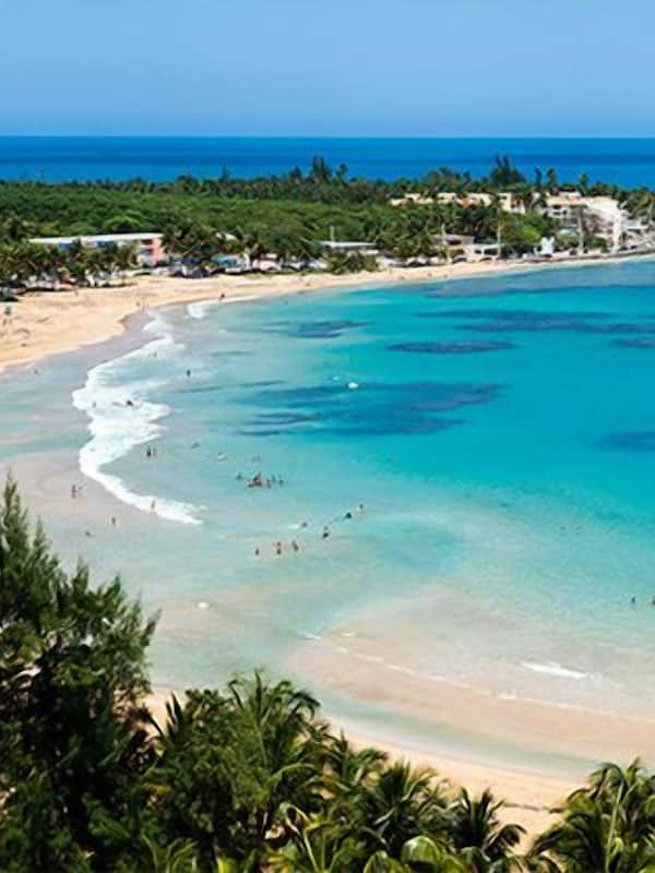 On the beach, sun loungers, beach towels